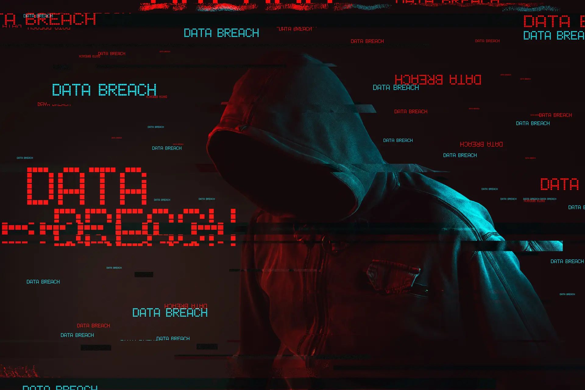 Data breach concept with faceless hooded male person