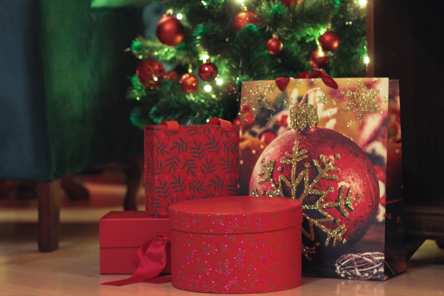 assorted gift boxes under christmas tree