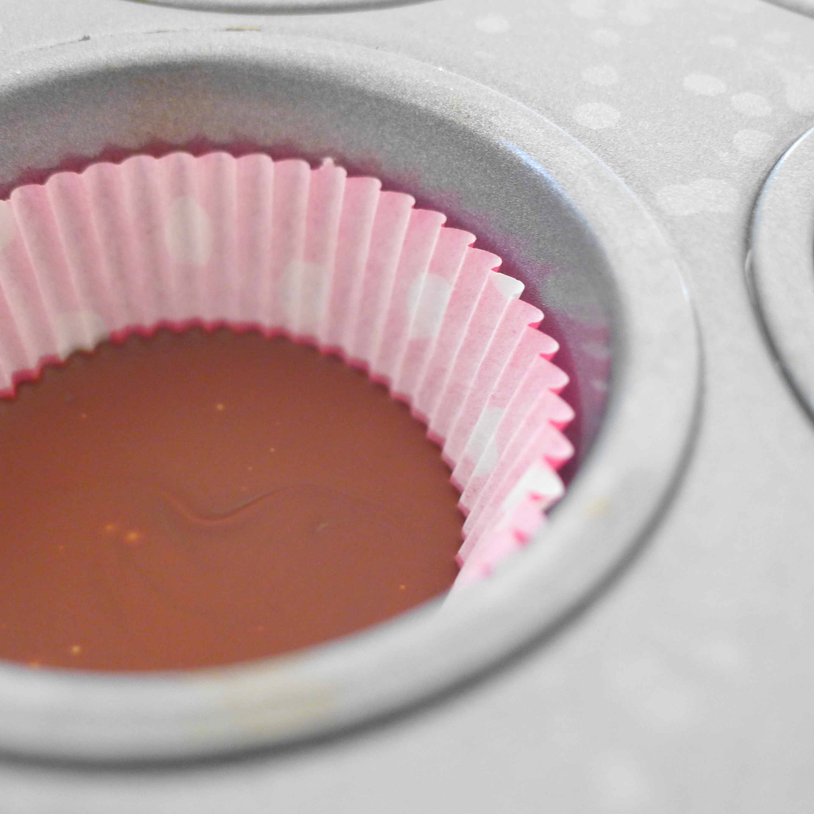 Distribute Melted Chocolate in Cups; then Freeze- Step 3