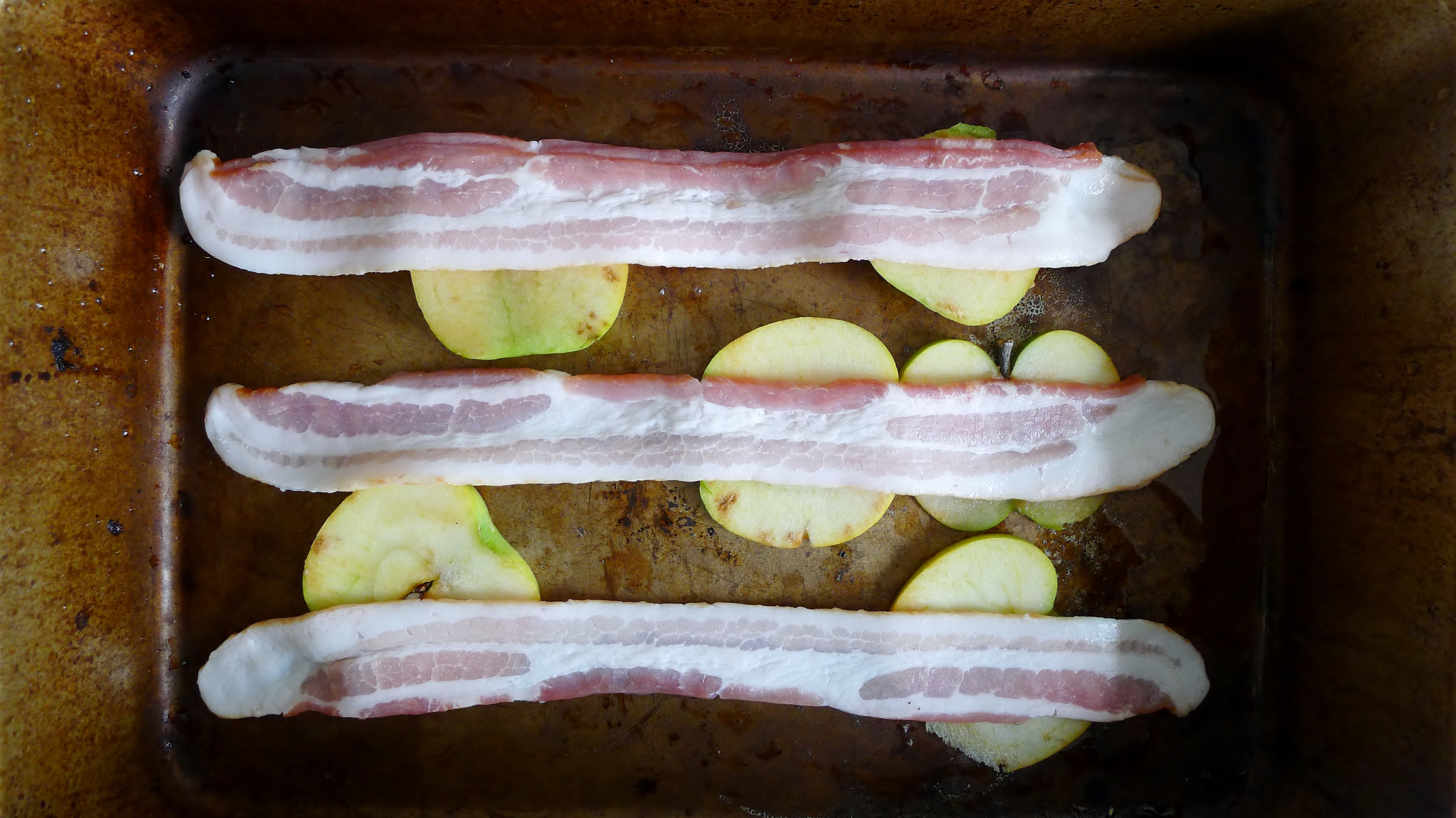 Sliced apples and applewood smoked bacon