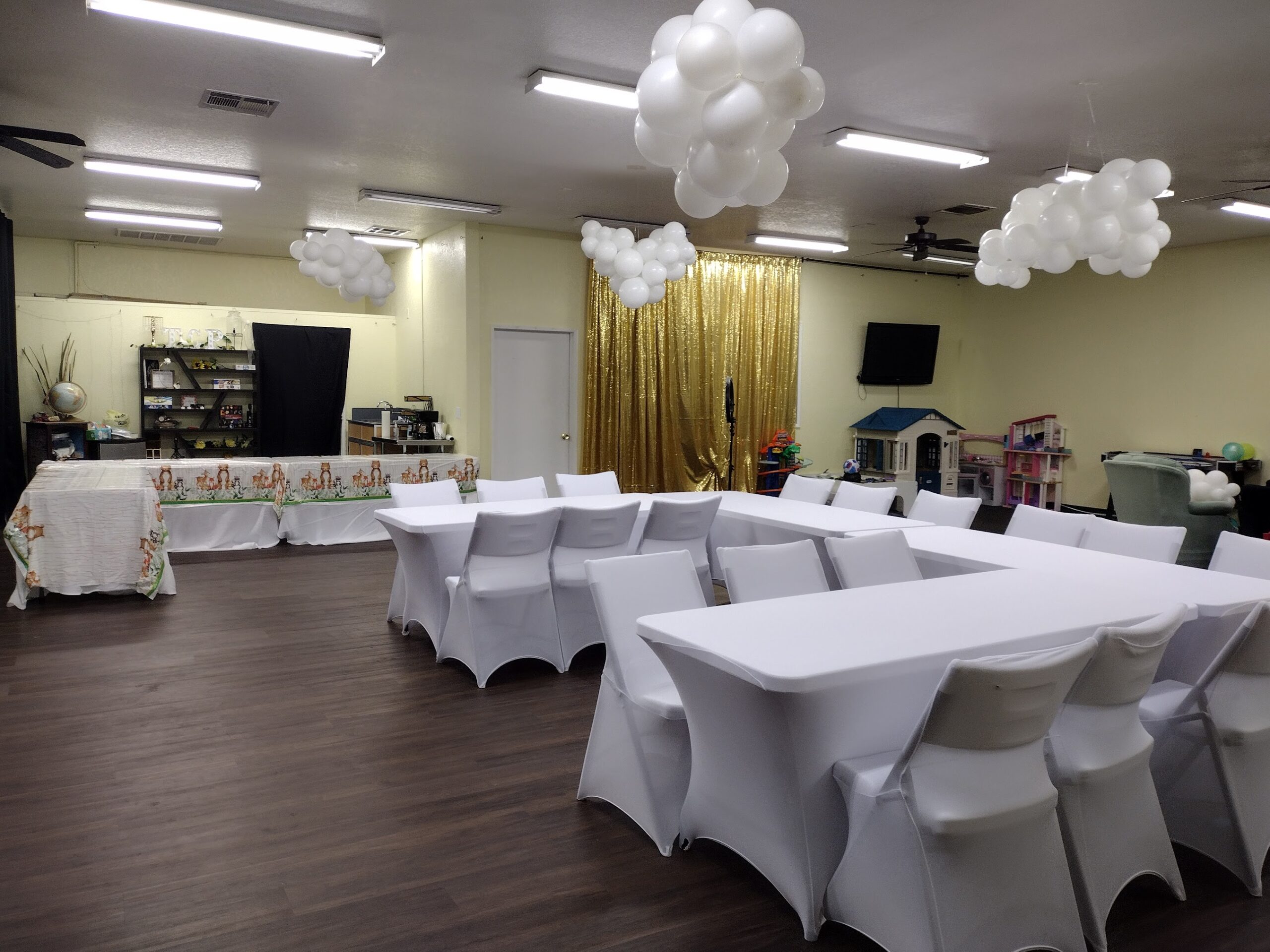 covered tables and chairs with balloon clouds at the coolest place in Fort Mohave