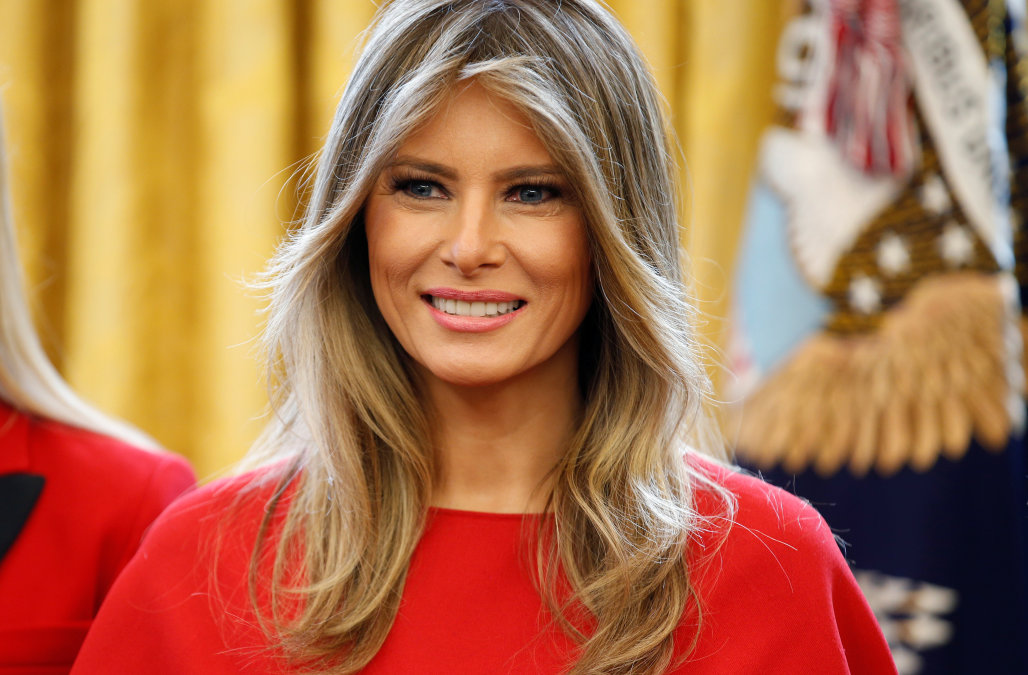 U.S. first lady Melania Trump watches as U.S. President Donald Trump speaks in the Oval Office of the White House, in Washington