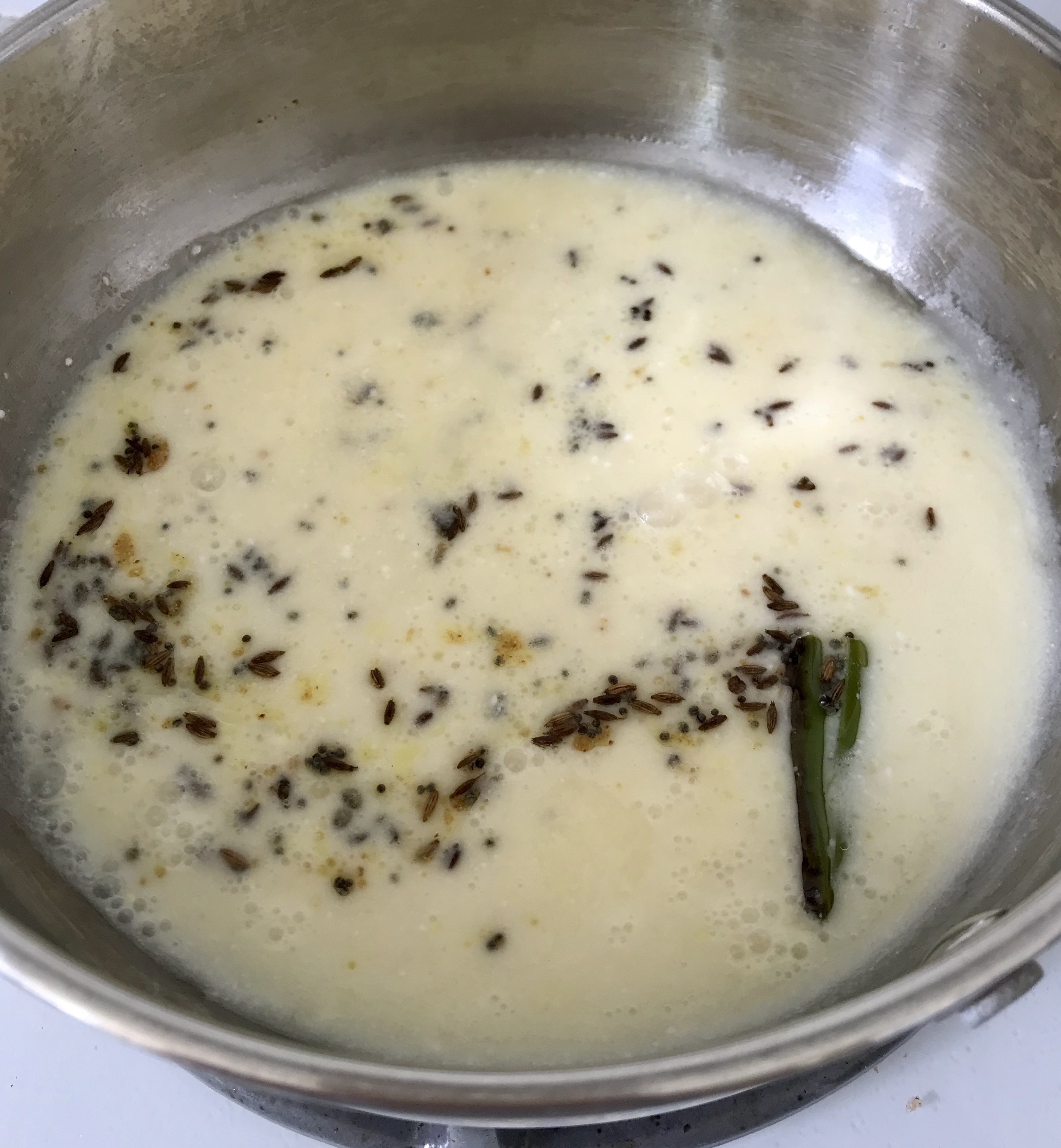 add besan-yogurt to tadka