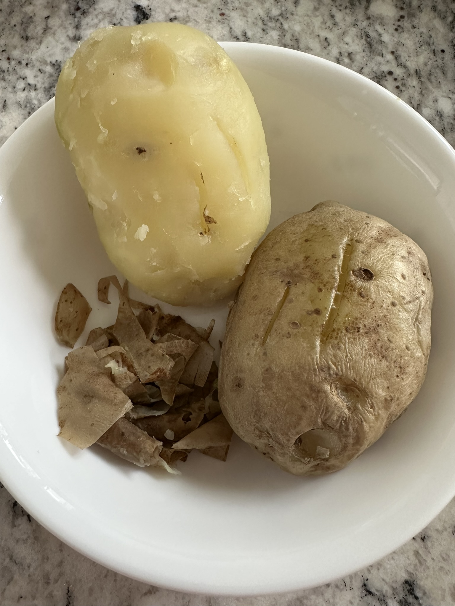 peel skin from cooked potatoes