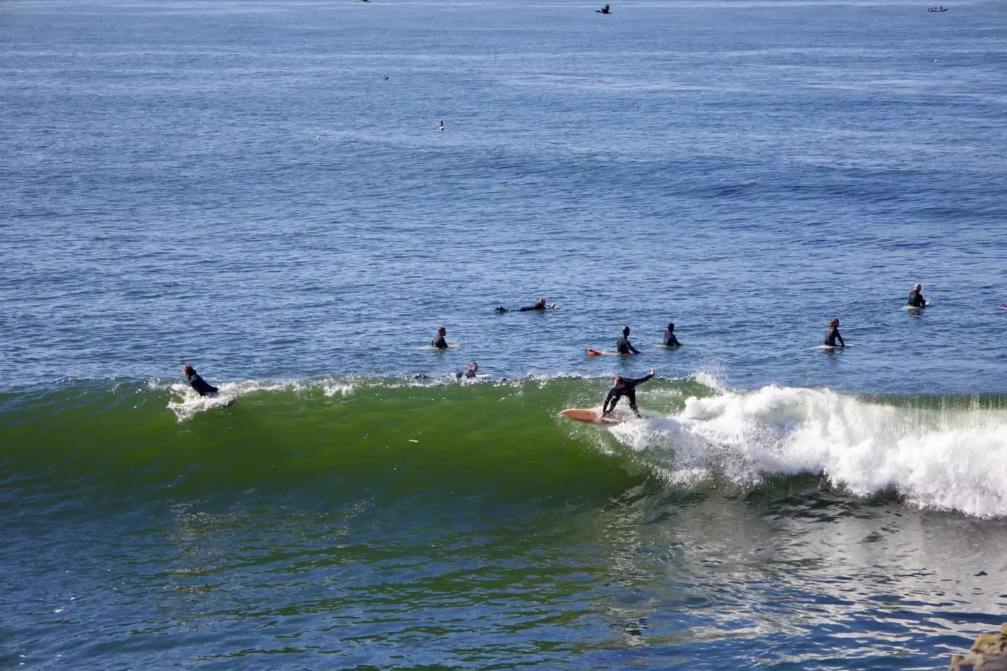 Surfers at Lighthouse Point
