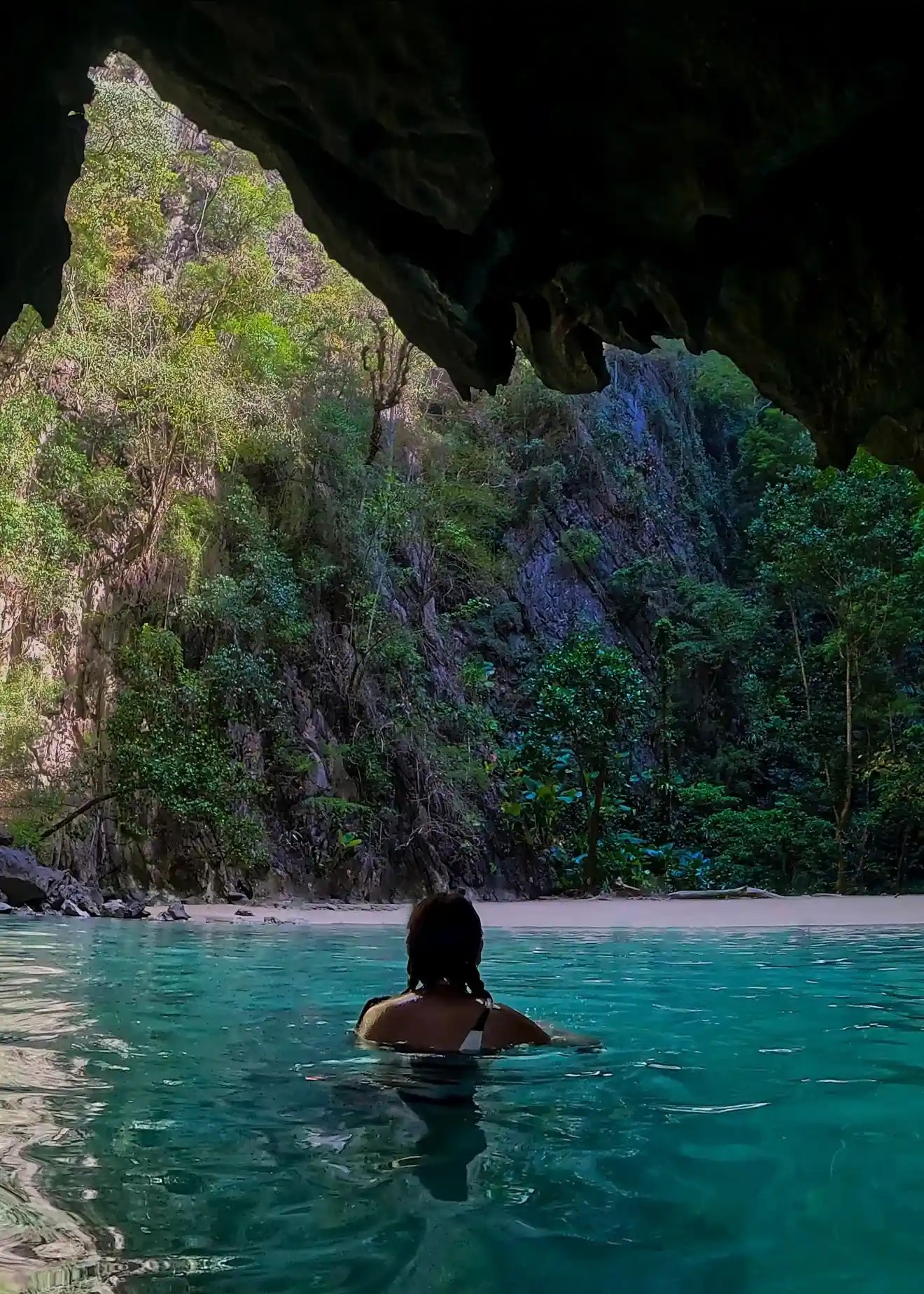 Swimming in Koh Mook's Emerald Cave