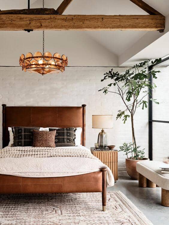 A bedroom featuring chestnut, cream, and green color palette.