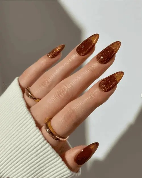 velvet cinnamon brown fall nails with shimmery finish, cozy autumn manicure idea