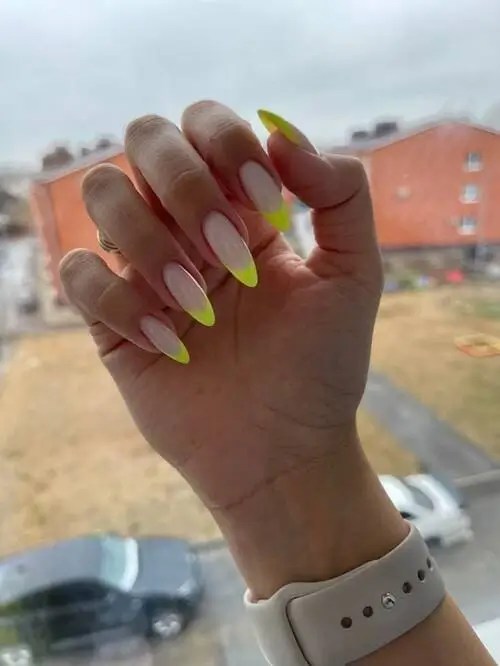 Bright french tips are popular nails for summer