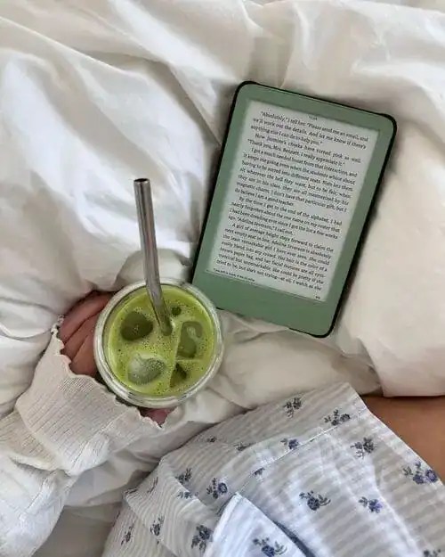 College student waking up early in a quiet dorm room to shower and do laundry before others are awake – the secret to peaceful, productive mornings.
