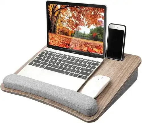 Lap desk for dorm room study sessions. Perfect for working from bed or small spaces—lightweight, portable, and ideal for laptops, books, or snacks.