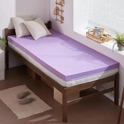 Transform your rock-hard dorm mattress with a 2-inch memory foam topper. Sleep better, wake up pain-free, and turn your dorm bed into a cozy retreat you'll actually enjoy.