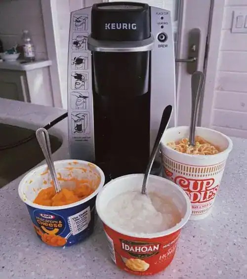 Image of a Keurig being used to cook ramen noodles in a dorm room. Perfect college hack for quick, no-kitchen meals using your coffee maker.