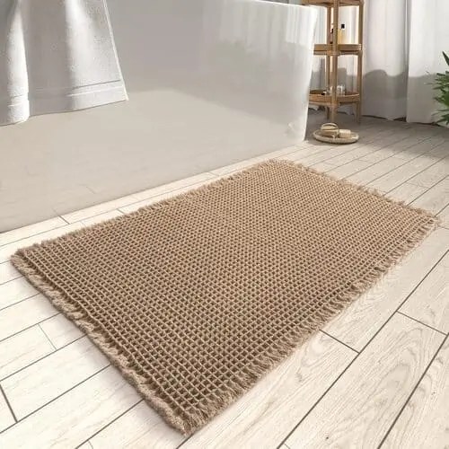 Natural bath mat adds to boho bathroom decor