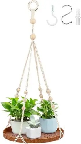 Hanging macrame shelf adds boho decor to area above the toilet