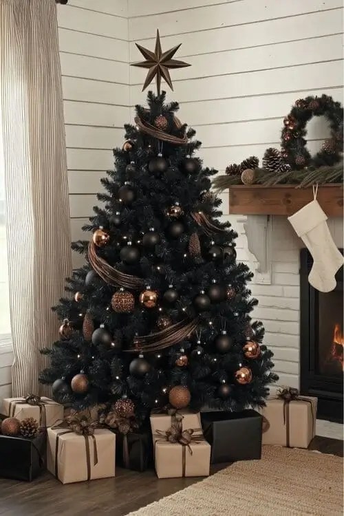 Black and bronze Christmas tree theme with matte black ornaments, bronze baubles, and wrapped gifts in a cozy modern living room