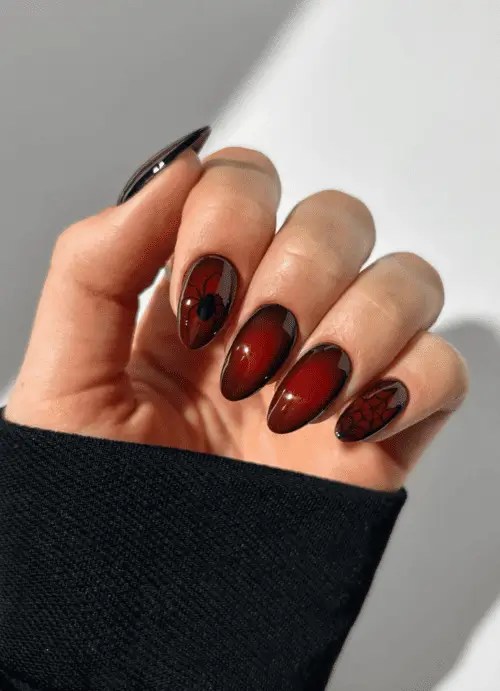 blood red aura Halloween nails with black spider and web nail art, gothic spooky manicure idea