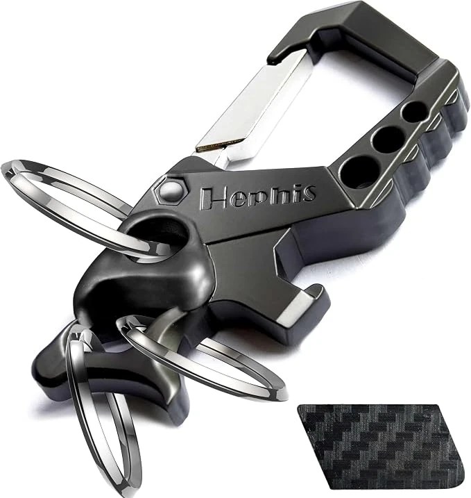 Black keychain multitool with carabiner-style clip and multiple key rings, a practical stocking stuffer idea for teen boys