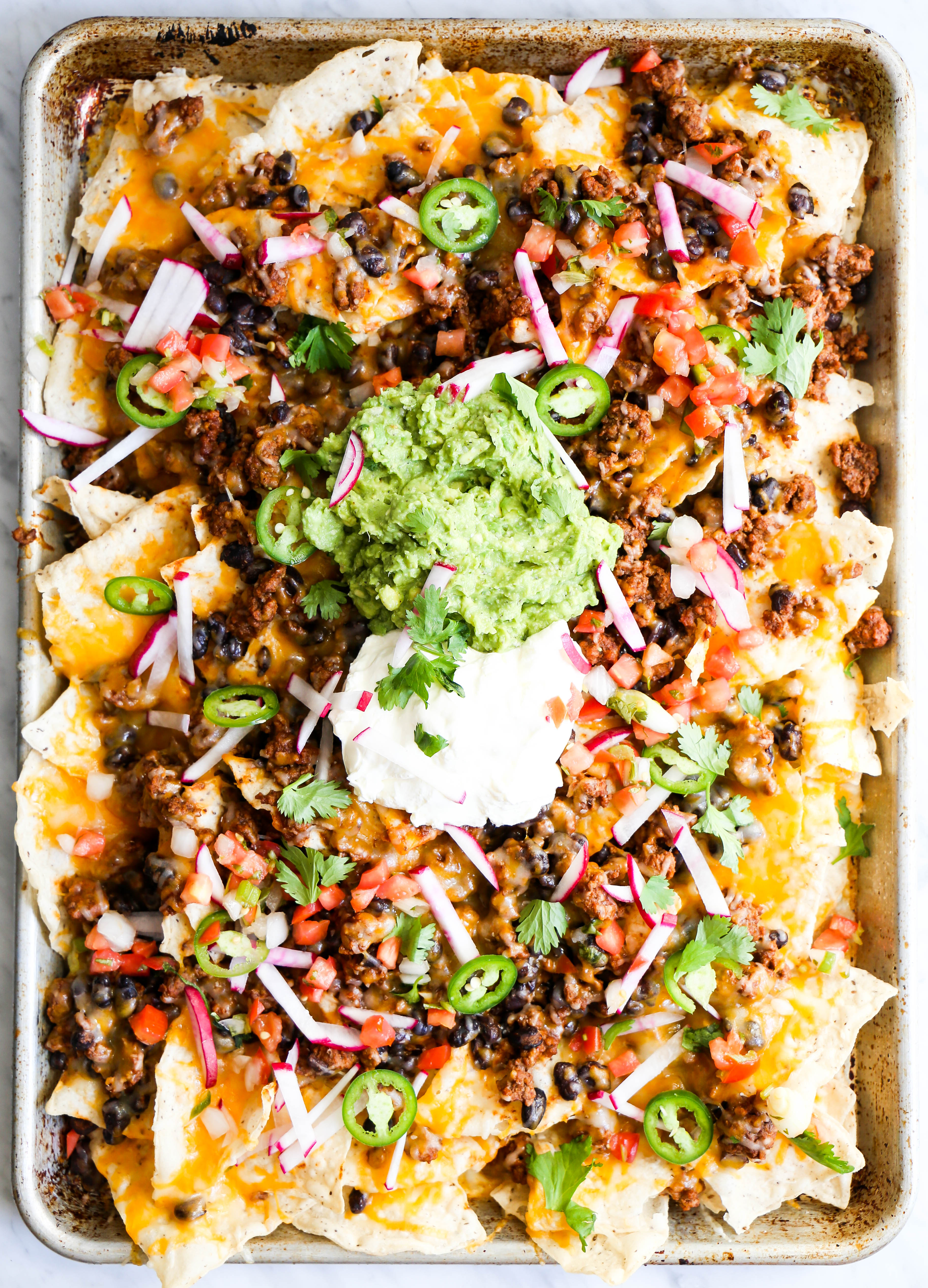 Cook, stirring often, until meat crumbles and is no longer pink and onions are softened, about 8 minutes. Ultimate Game Day Nachos The Defined Dish Recipes