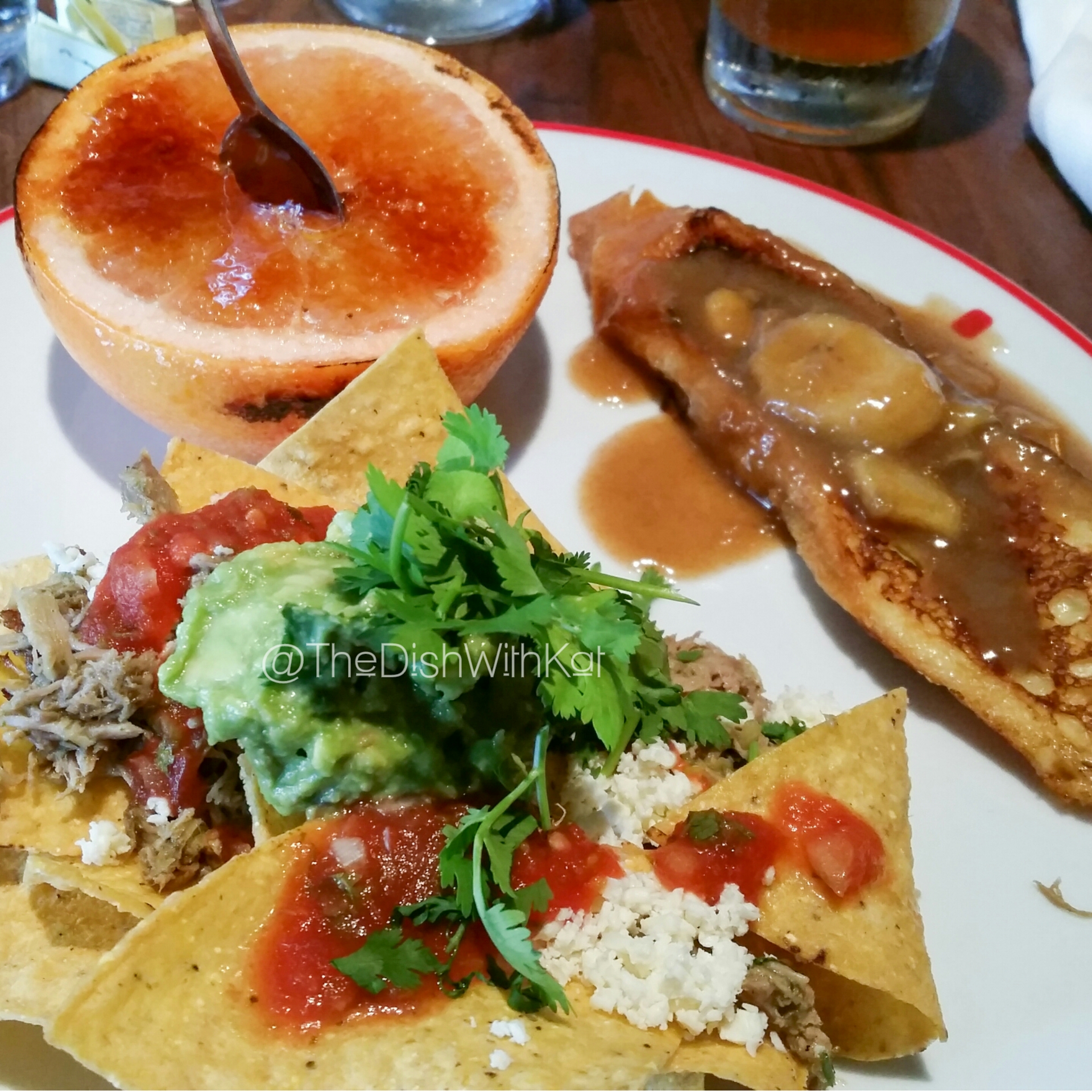 Plate number two with (clockwise) Brûléed Pink Grapefruit, Sweet Bread French Toast, and Carnitas Nachos.