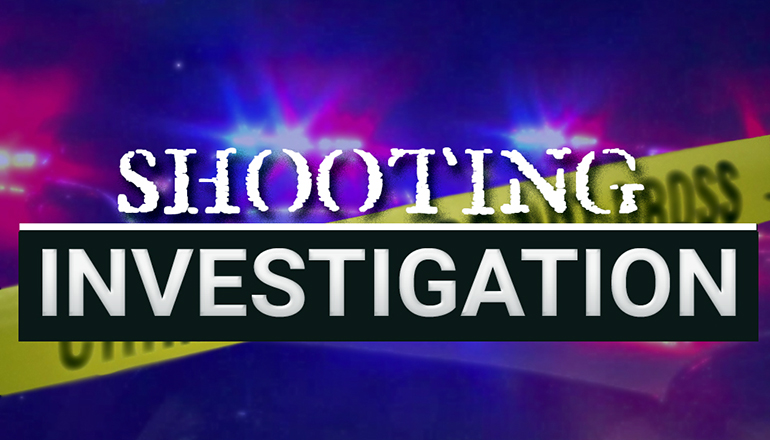 3D police line tape against defocussed blood splatter background