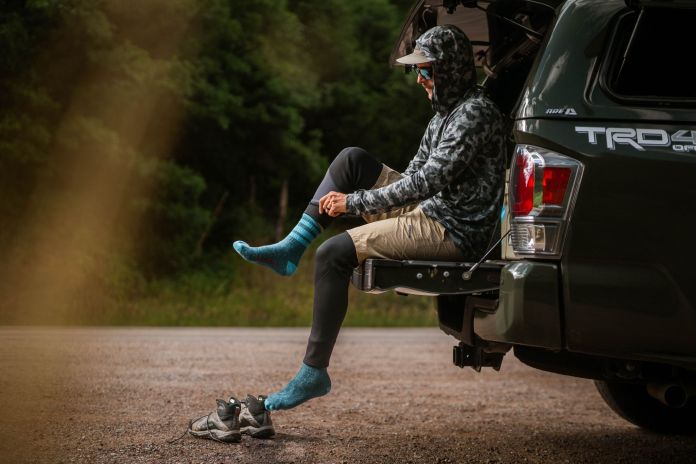 sitting on the tailgate