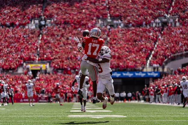Ohio State's Carnell Tate makes a wild touchdown catch for the Buckeyes. (Photo by Ohio State Athletics)