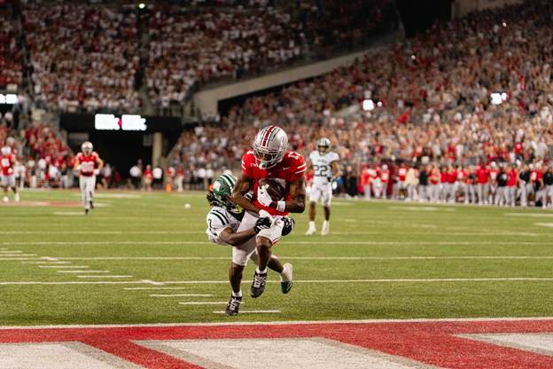 Carnell Tate makes a touchdown catch for Ohio State (Photo by Ohio State Athletics)