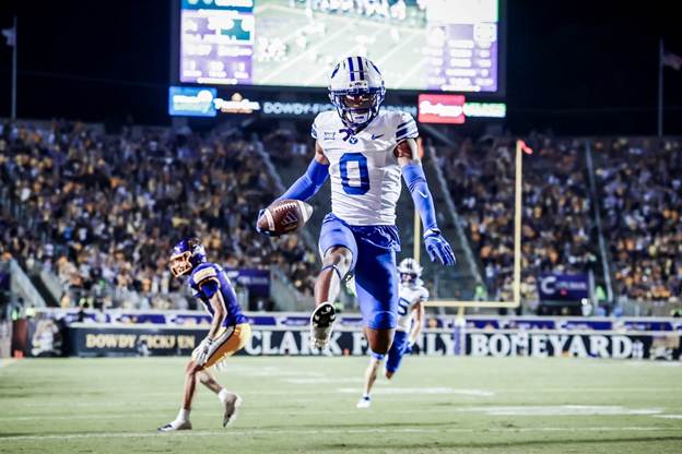 Evan Johnson scores on a pick-six for BYU (Photo by BYU Athletics)