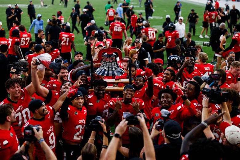 Cincinnati gets the Victory Bell over Miami of Ohio (Photo by UC Athletics)
