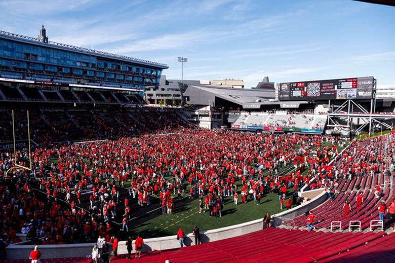 UC fans rush the field in Cincinnati, Ohio (Photo by Cincinnati Athletics)