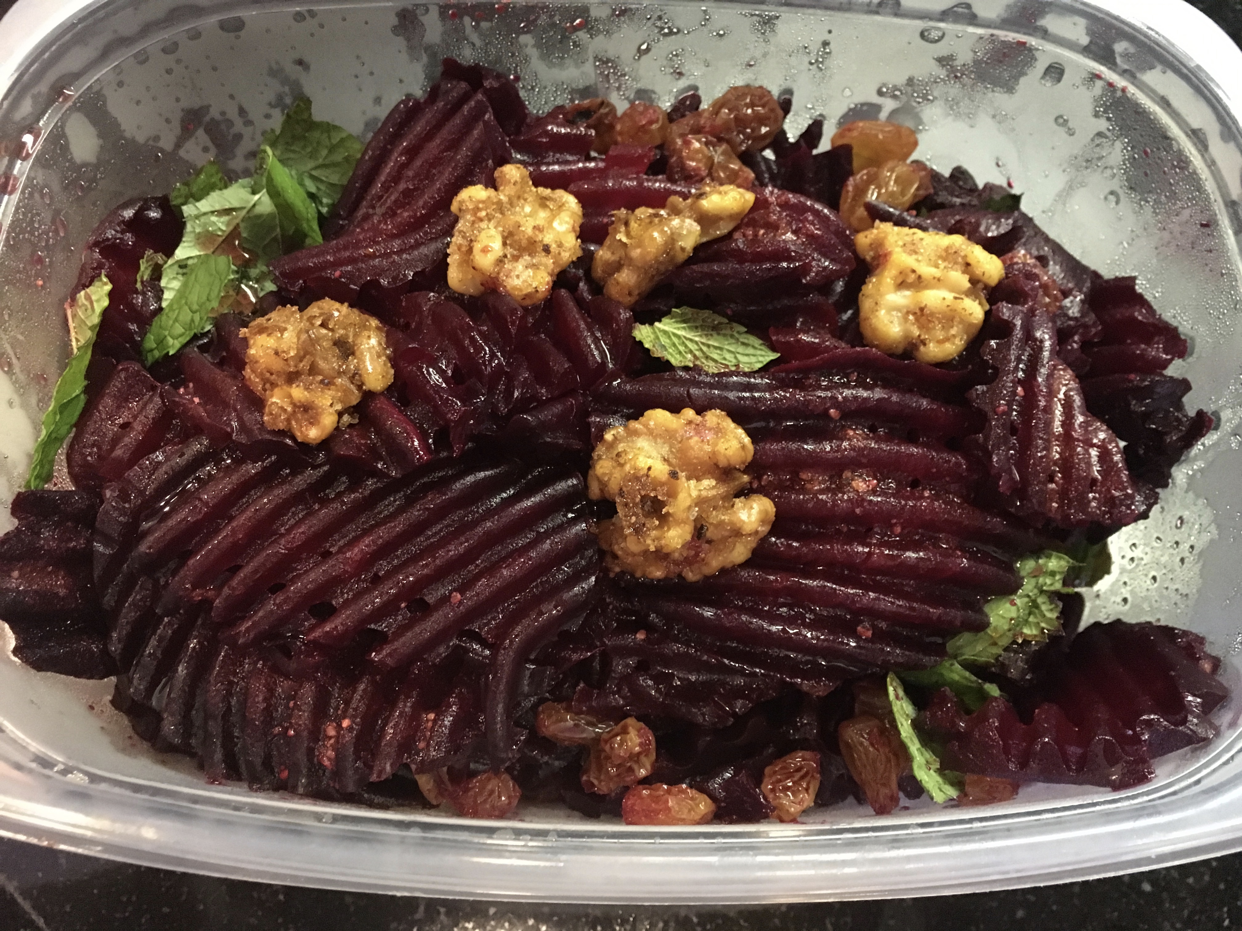 Braised Beets with Pickled Golden Raisins Spiced Walnuts and Mint