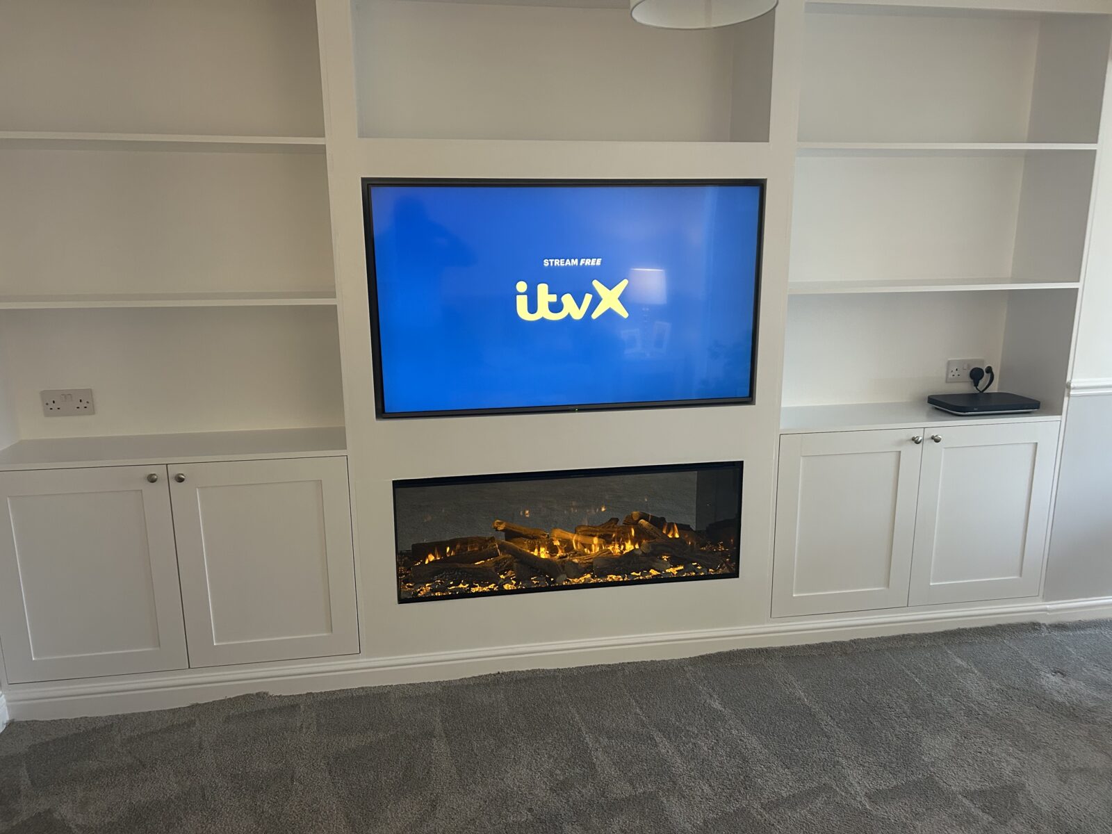 a finished media wall installation in bromley