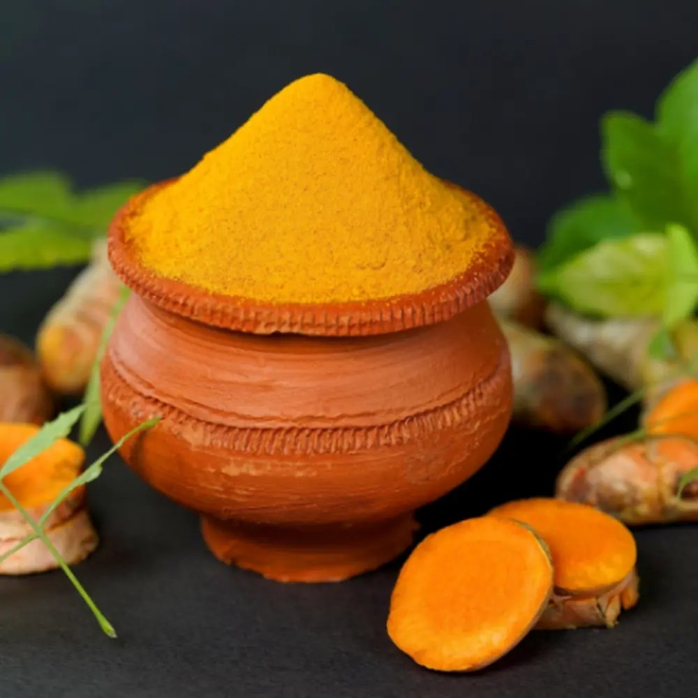 Tumeric in clay pot