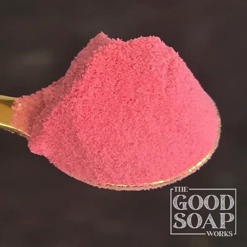 Close-up of Cranberry Powder on a spoon, a botanical ingredient used in soap and skincare by The Good Soap Works Co.