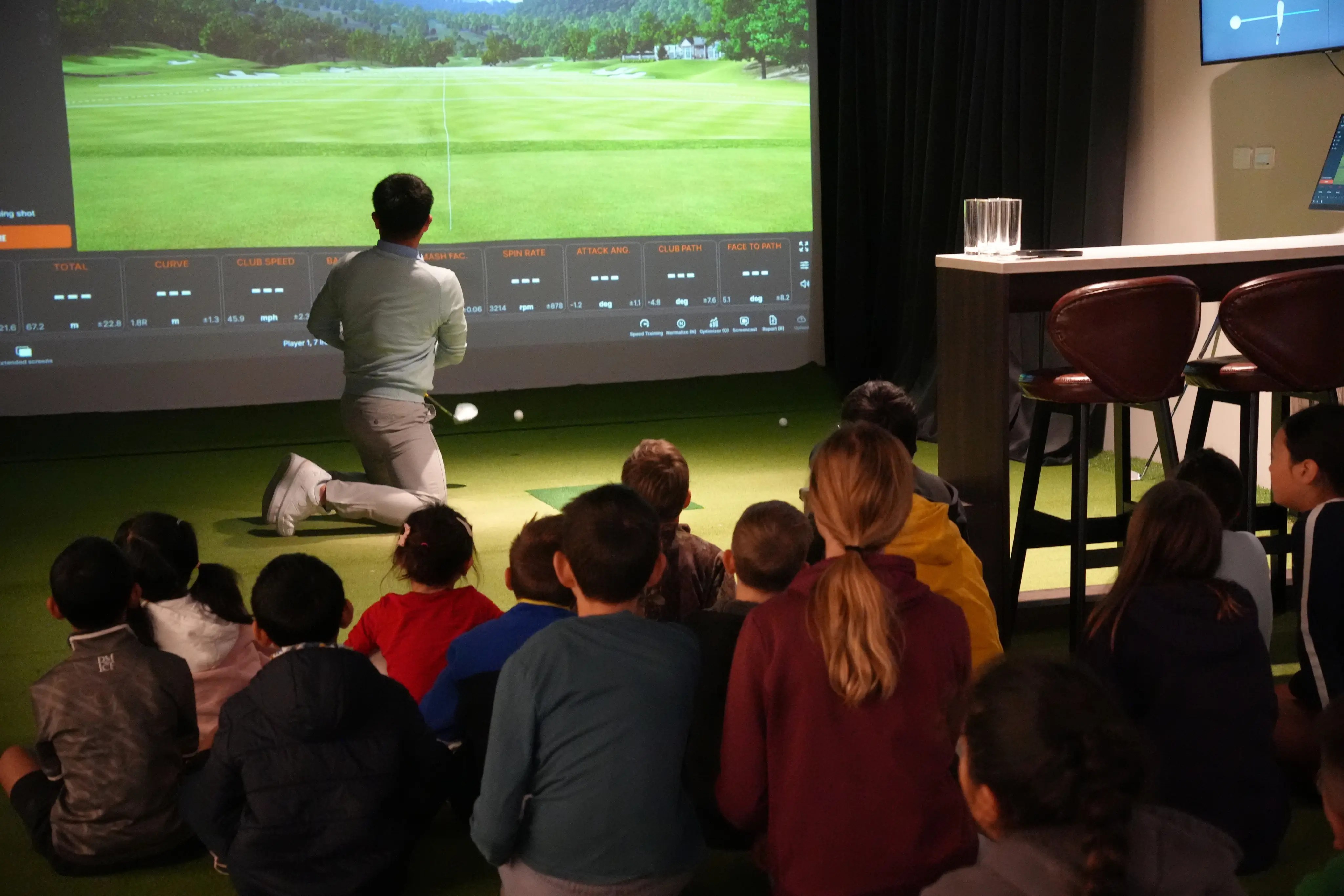 Children attending a junior golf programme at The Green Pinnacle in Auckland