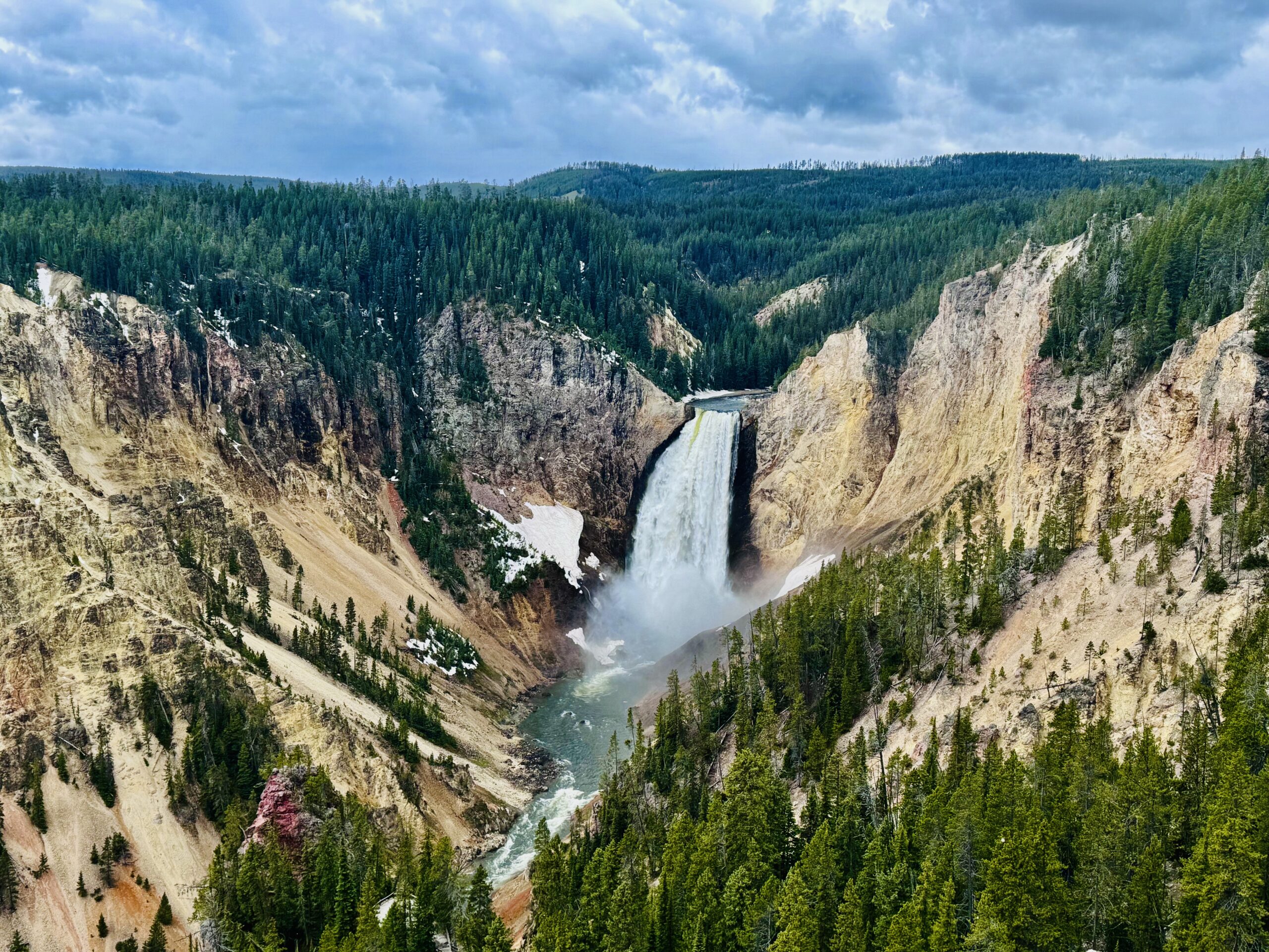 Iconic Lower Falls of the Yellowstone River plunging into the Grand Canyon of the Yellowstone