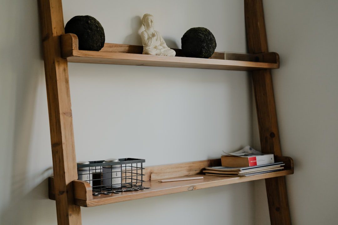 Wooden shelf with baskets and decorative items