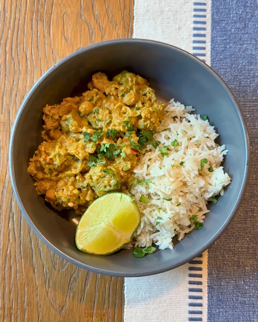 Okra chickpea and cauliflower coconut curry in a pot