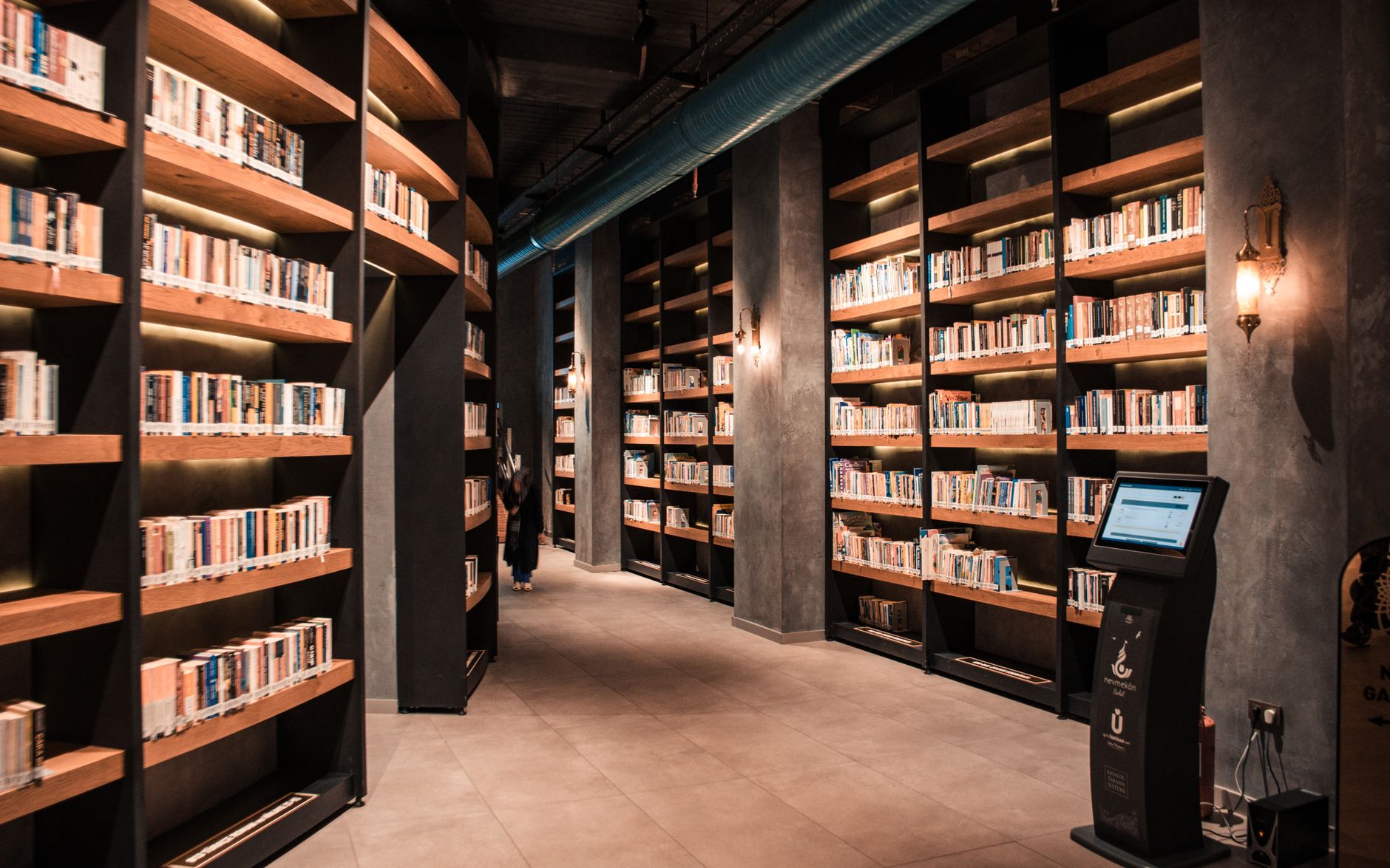brown wooden book shelves in the bookstore