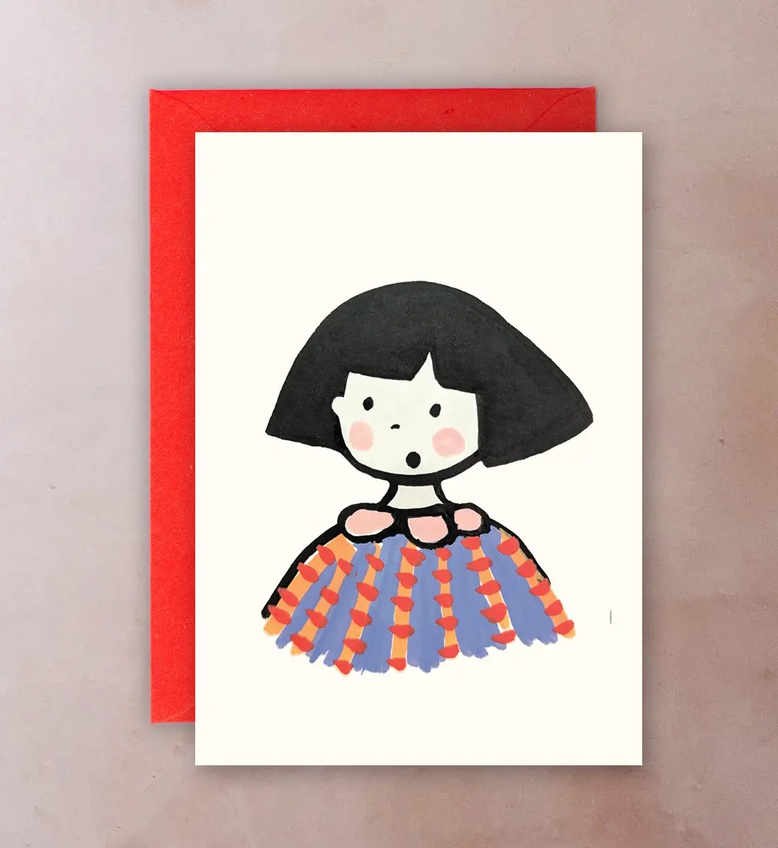 Front of card with illustration of Kiki, a pretty girl in a colourful dress