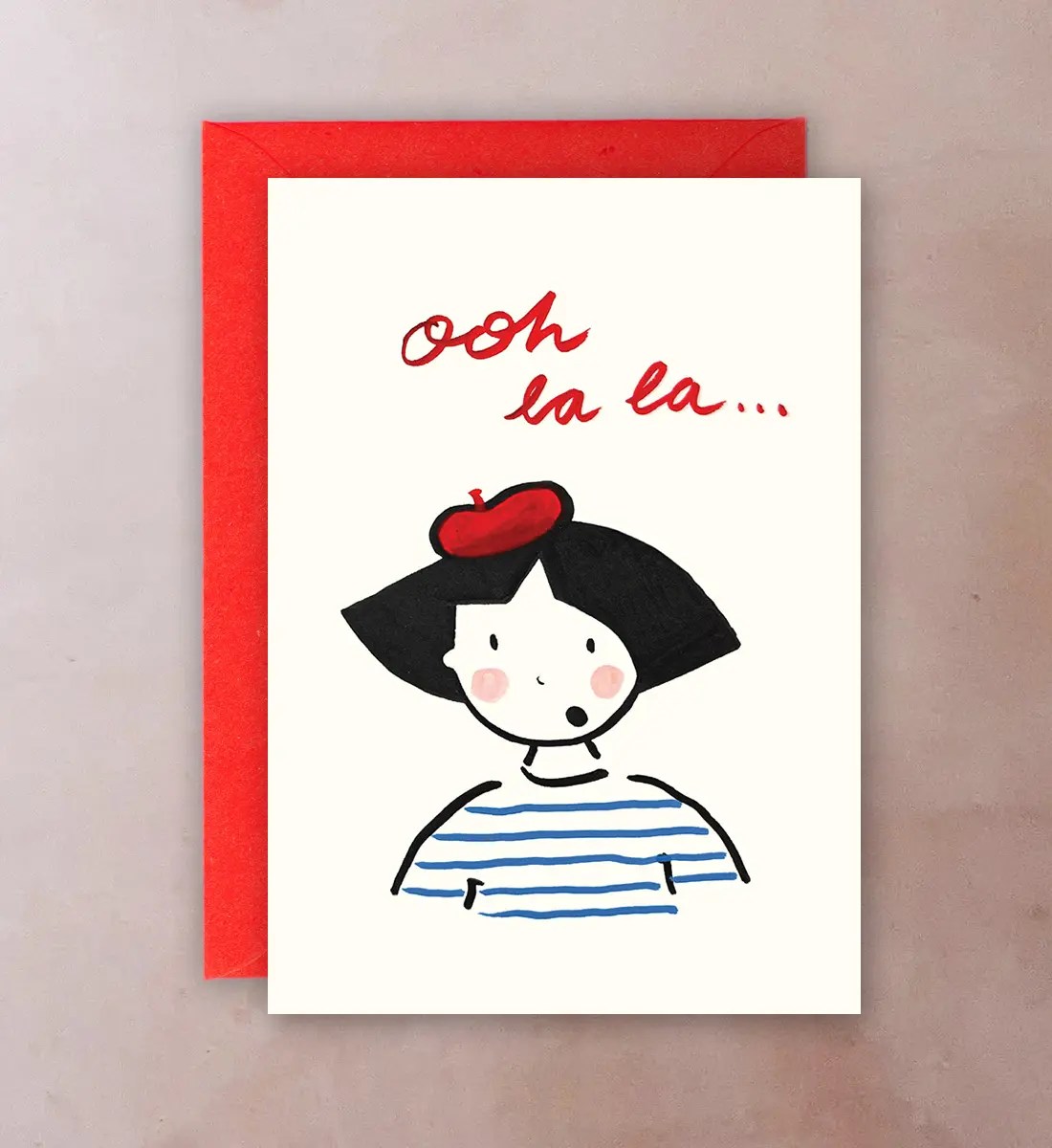 Front of card with illustration of French girl saying Ooh La La; celebration design