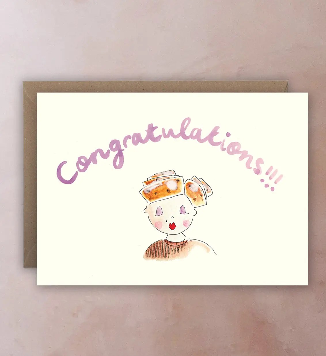 Front of card with illustration of woman whose hair is made of cinnamon buns; Congratulations text