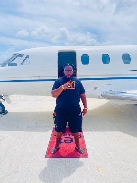 Jeremiah Whyre aka Jeremiah the Tycoon Having an Estimated Net Worth of $200 Million Standing With His Private Jet