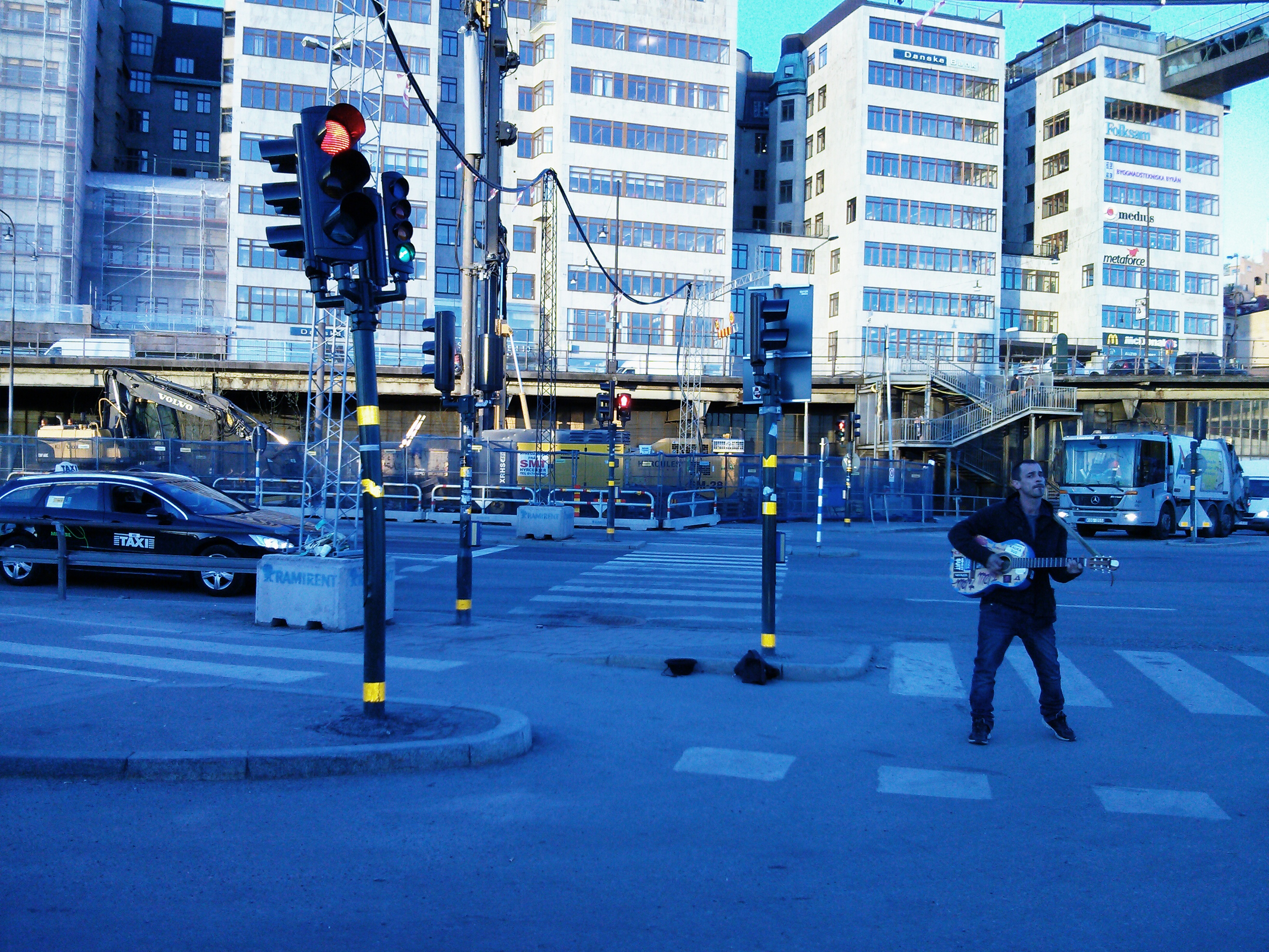 As I made my way back home I shot this great photograph of a guy standing in the middle of the road with a guitar. I have no idea what was going on.