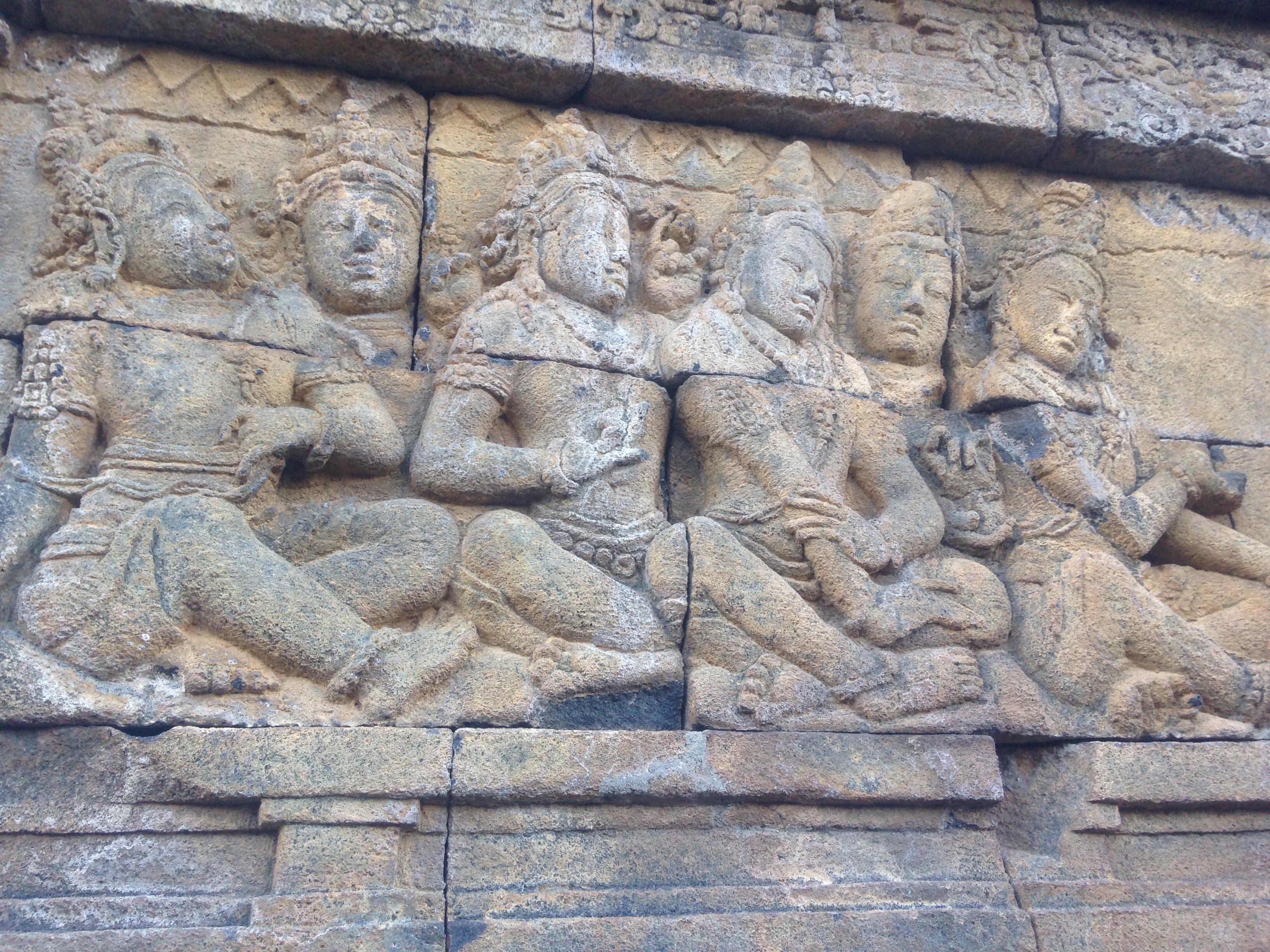 Carvings adorning the walls of Borobudur