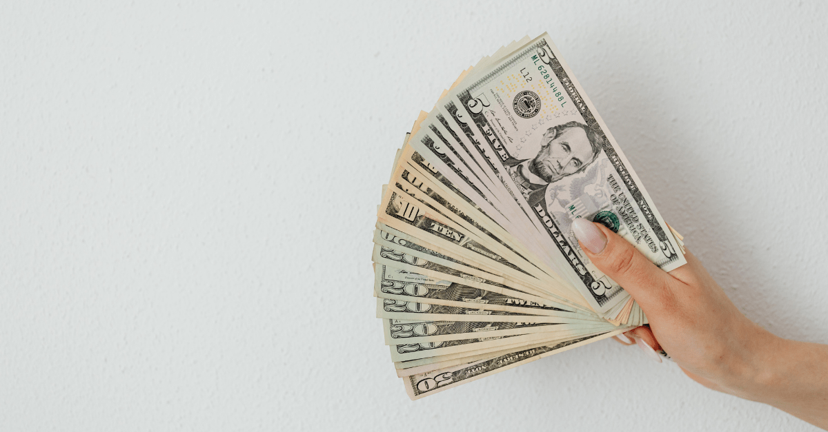 Woman holding money