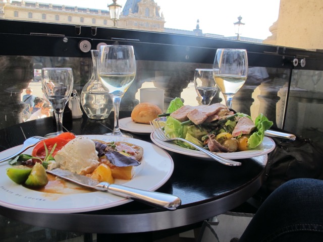 Watching the sun set over the Louvre at Cafe Marly
