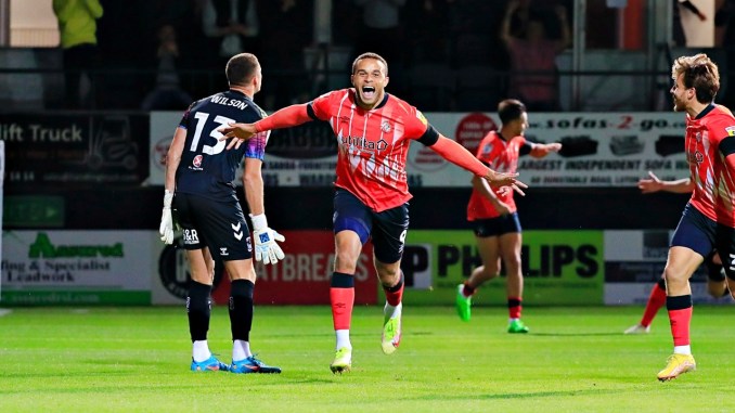 Carlton Morris celebrates his opener against Coventry