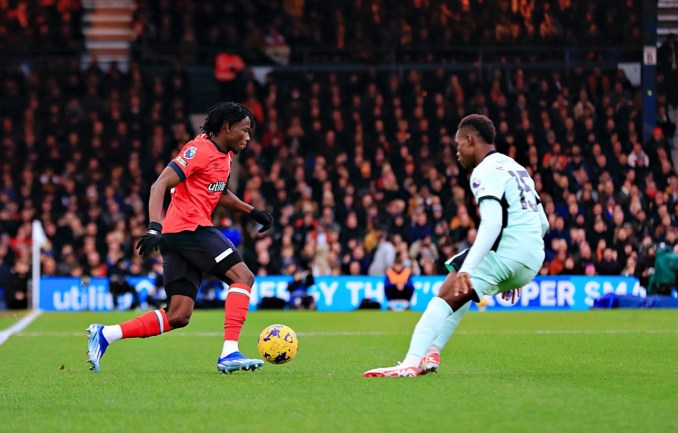 Issa Kaboré takes on Chelsea's Nicolas Jackson